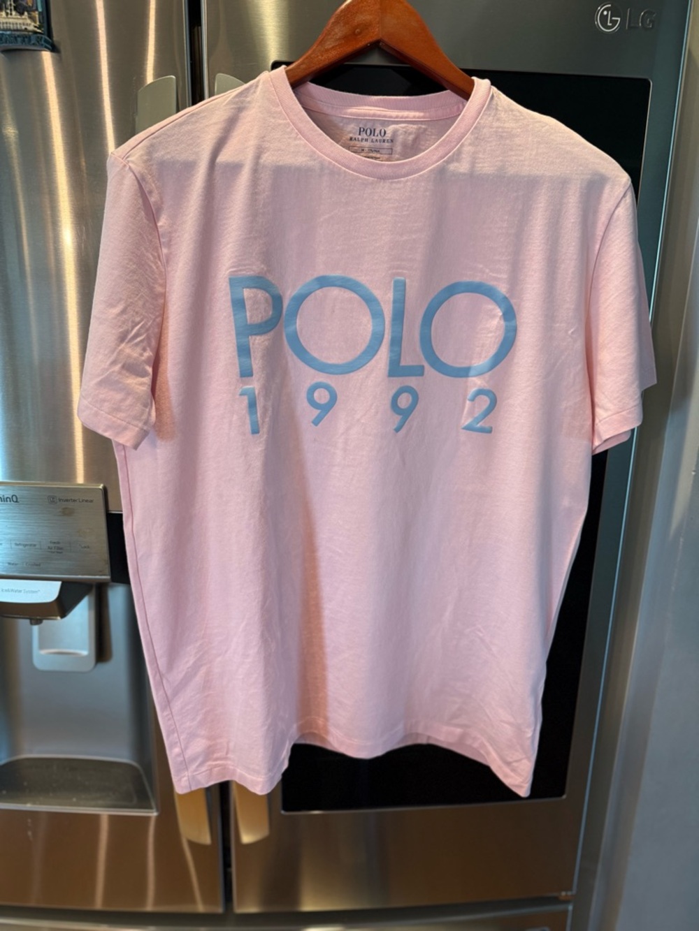 Polo 1992 Graphic Tee in Light Pink with Blue Logo. Men Medium